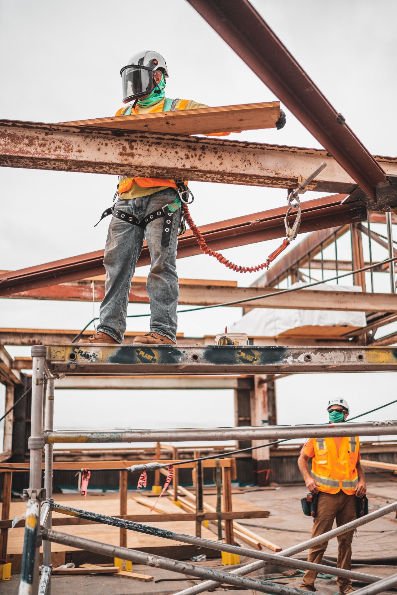 commercial builders Sunshine Coast - builder on scaffholding